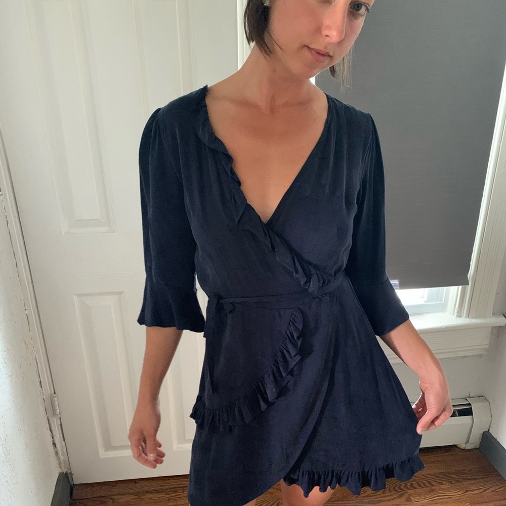 Sweet navy polka dot ruffle wrap dress